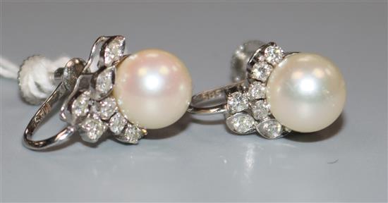 A pair of 14ct white gold, cultured pearl and diamond cluster set ear clips, 13mm.